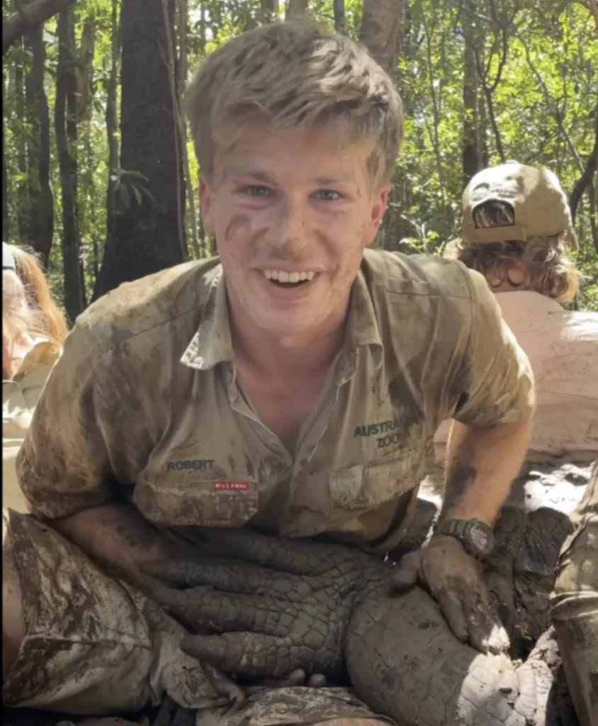 Robert Irwin with crocodile