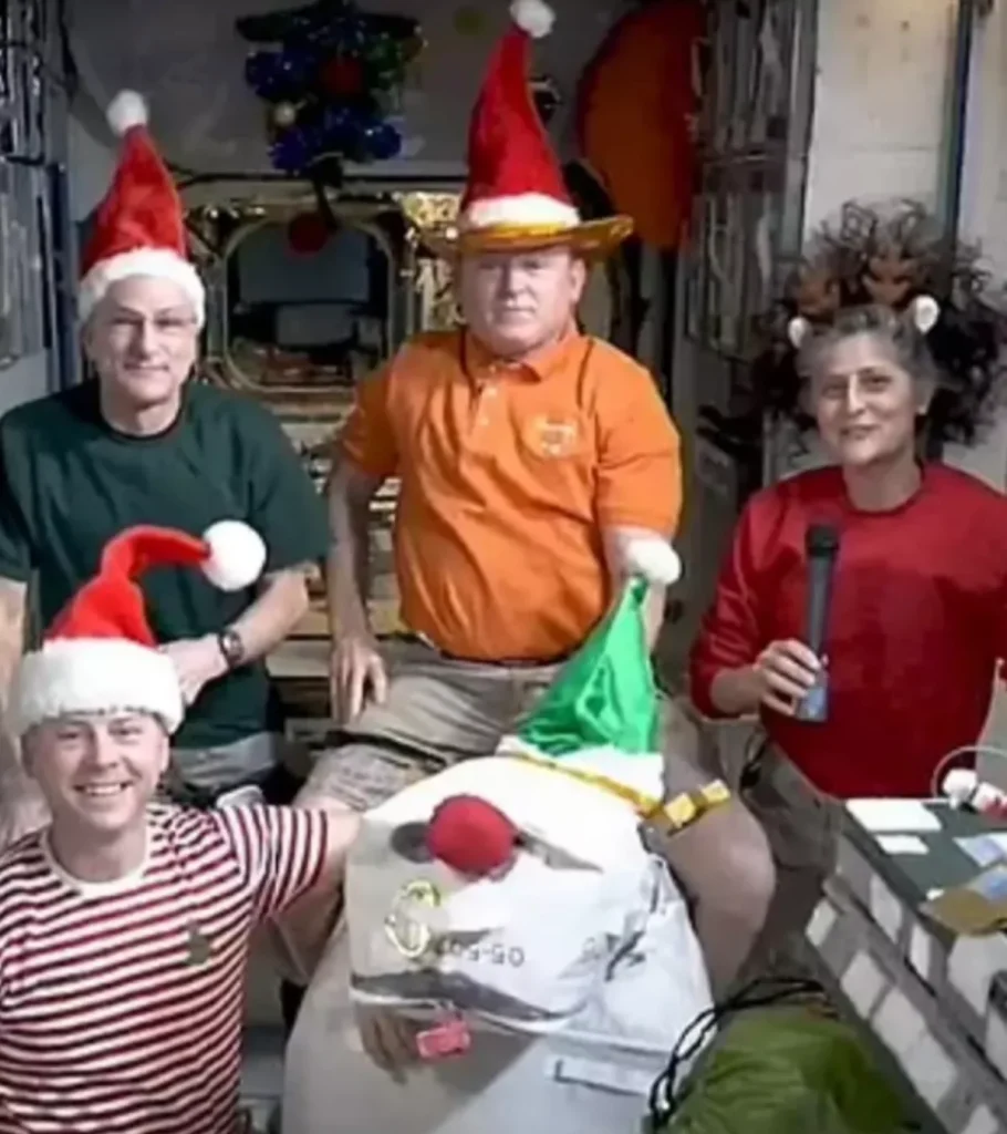 astronauts dressed in holiday attire